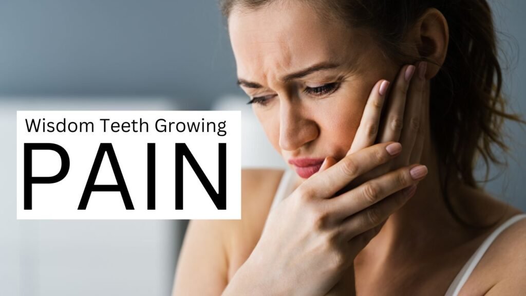 Woman with wisdom tooth pain, clutching her cheek Woman with wisdom tooth pain clutching her cheek